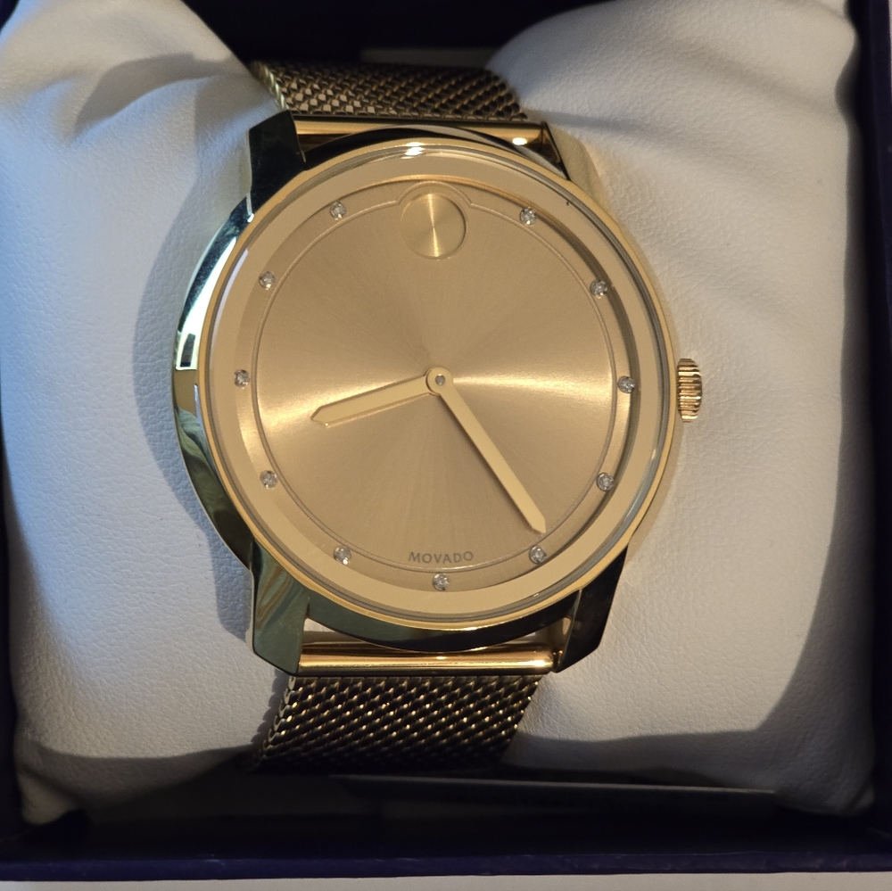 NEW Movado Gold Mesh Watch. Never worn. New with tags and receipt.